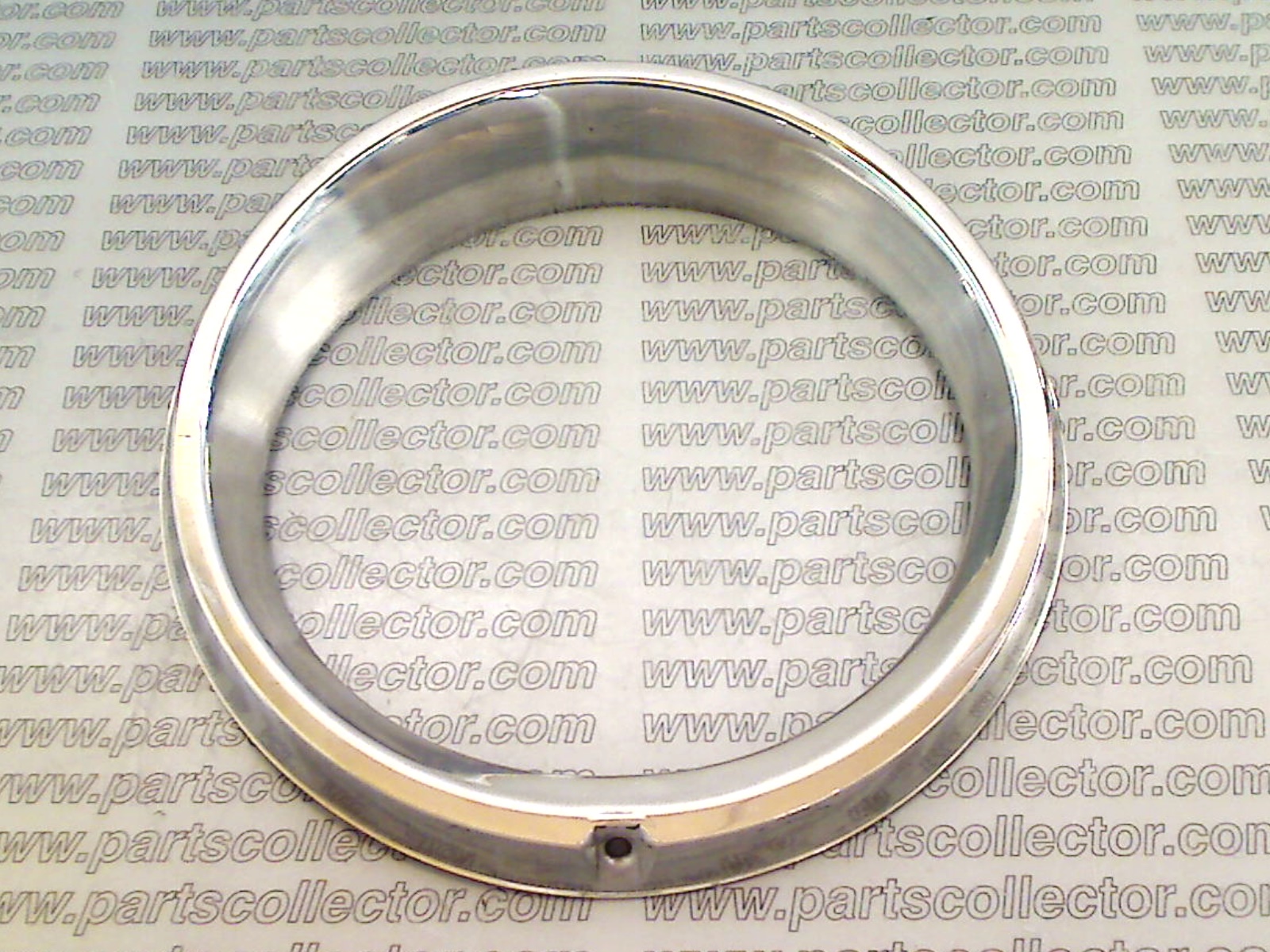 HEADLIGHT BEZEL LH