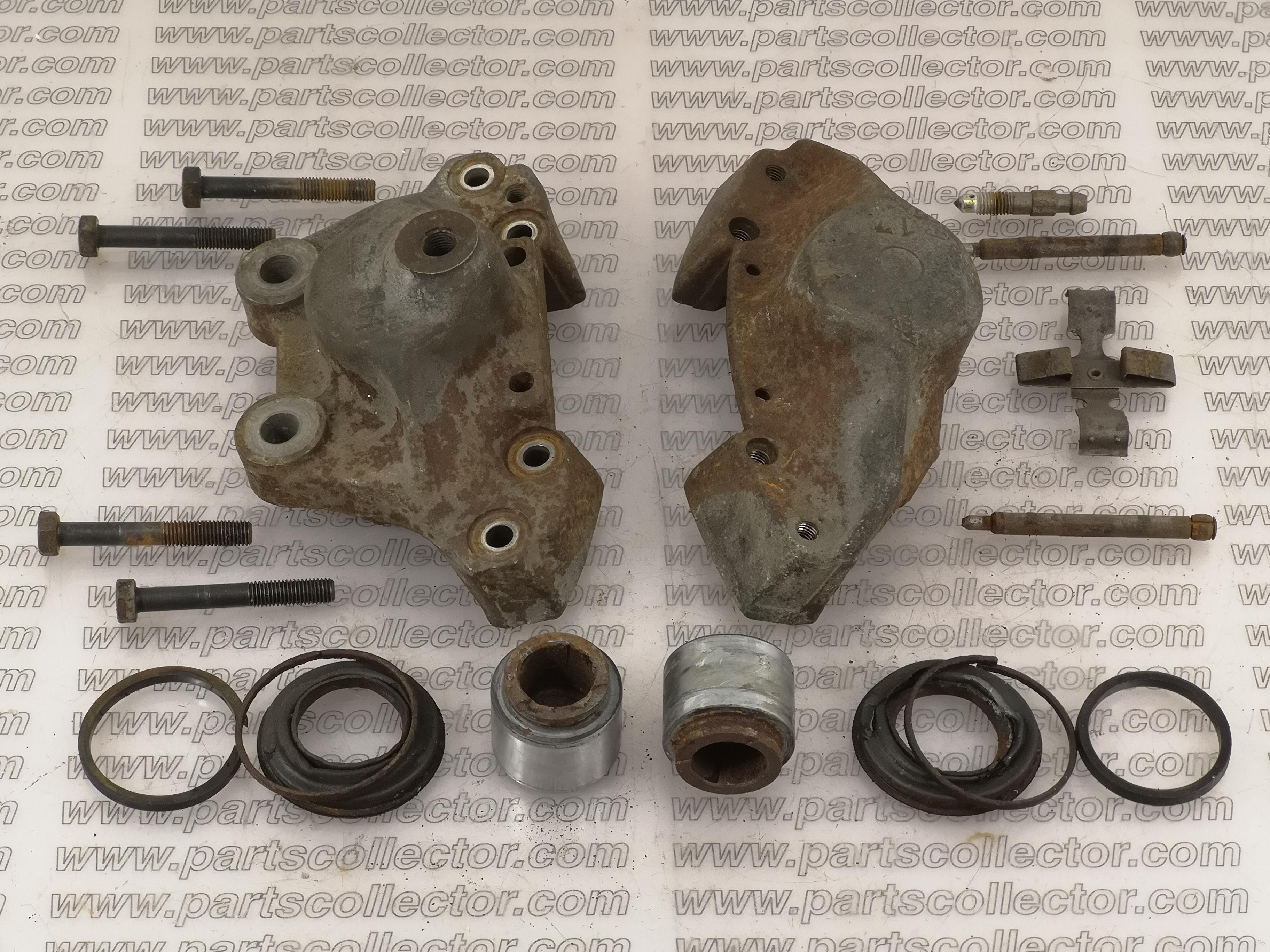 RESTAURO PINZE FRENO ATE DA 33mm CON SOSTITUZIONE DEGLI ELEMENTI DI TENUTA, PULIZIA, E LUCIDATURA DELLE SUPERFICI DI SCORRIMENTO. ZINCATURA O VERNICIATURA DOVE RICHIESTO.DOVE NECESSARIO RICOSTRUZIONE DEI PISTONCINI ANCHE FUORI MISURA - Sistema Frenante -